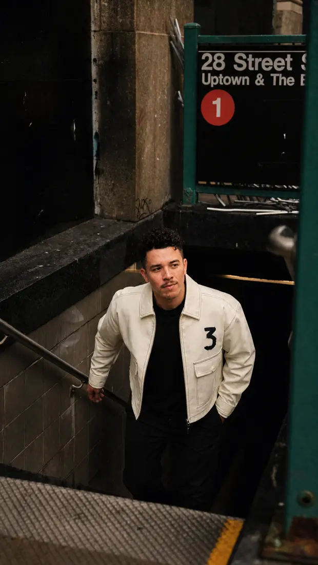 The same AI creator walking out of a New York subway at night